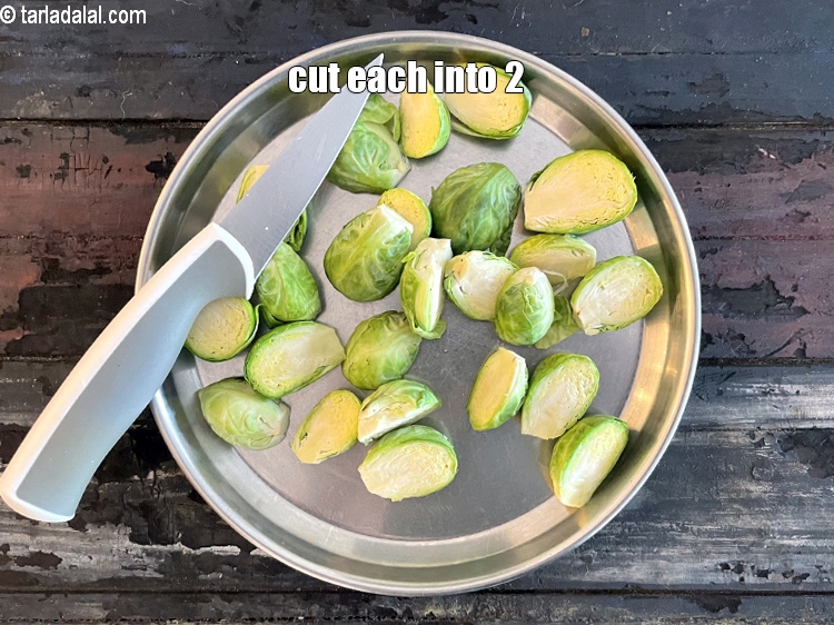 Step 4 – Cut each vertically into 2, if the brussel sprout is little bigger in size cut …
