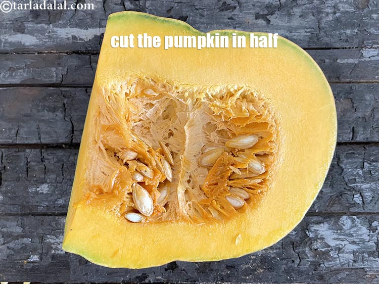 Step 4 – Cut the pumpkin in half.