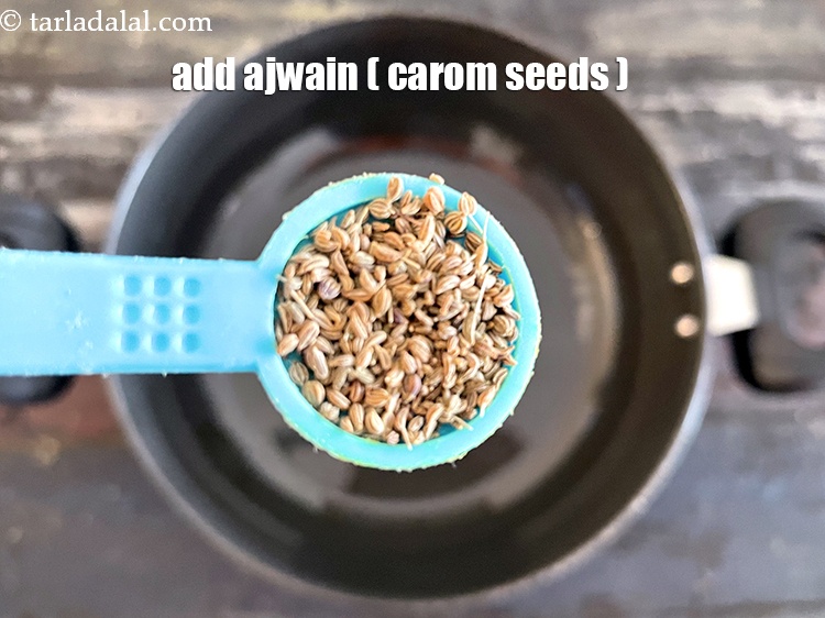 Step 20 – Add&nbsp;1/2 tsp&nbsp;<a href="https://tarladalal.com/glossary-carom-seeds-ajwain-thymol-seeds-bishops-weed-266i">carom seeds (ajwain)</a>.