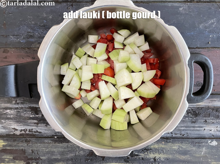 Step 15 – Add&nbsp;<meta charset="UTF-8" />2 cups&nbsp;<a href="glossary-bottle-gourd-cubes-1336i">bottle gourd (doodhi / lauki) cubes</a>.