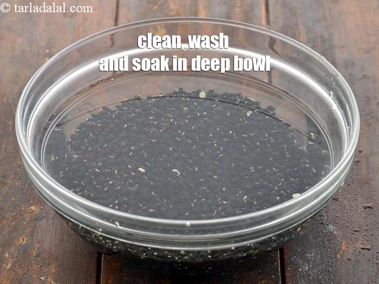 Step 4 – Clean, wash and soak the whole urad in a deep bowl.