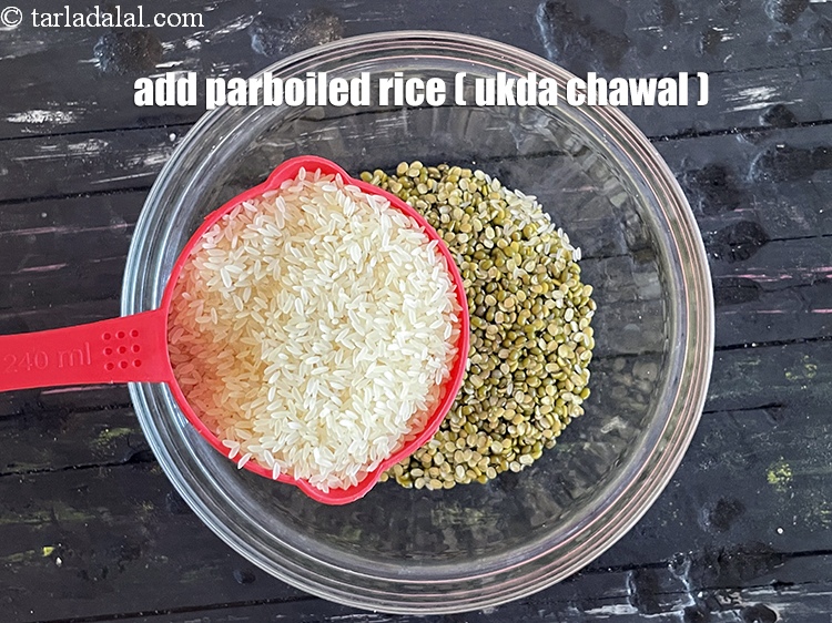 Step 5 – Add&nbsp;1 cup&nbsp;<a href="https://www.tarladalal.com/glossary-parboiled-rice-ukda-chawal-538i">rice (ukda chawal)</a>&nbsp;or parboiled rice.