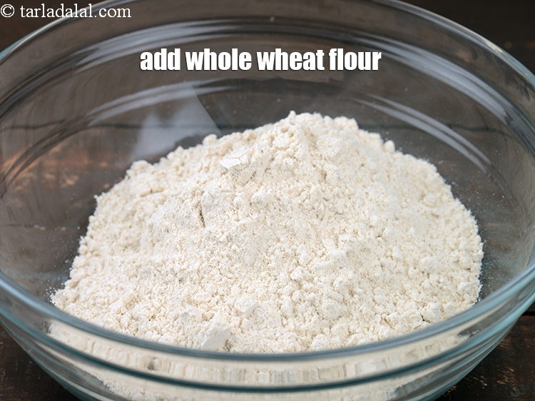 Step 4 – Add 1 cup <a href="https://www.tarladalal.com/glossary-whole-wheat-flour-gehun-ka-atta-gehun-ka-aata-429i">whole wheat flour (gehun ka atta)</a>.