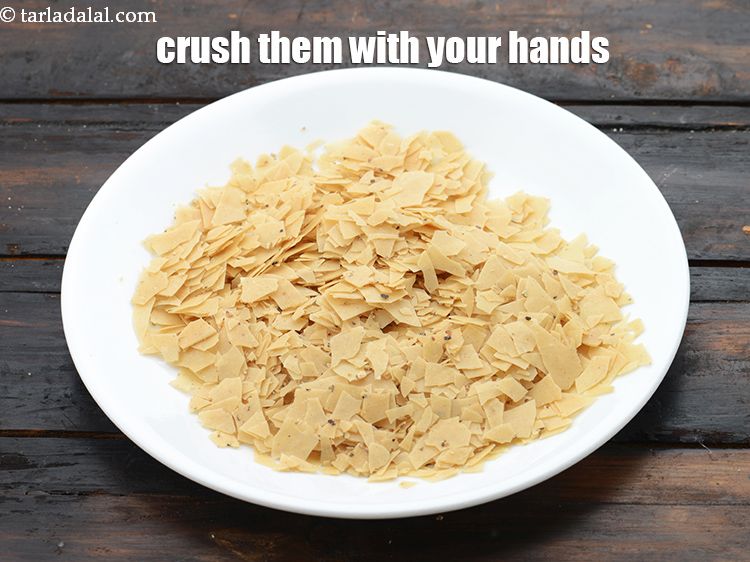 Step 4 – Crush them in small pieces with your hands. We need 3/4 cup&nbsp;<a href="https://www.tarladalal.com/glossary-crushed-papad-2648i">crushed papad</a>.&nbsp;