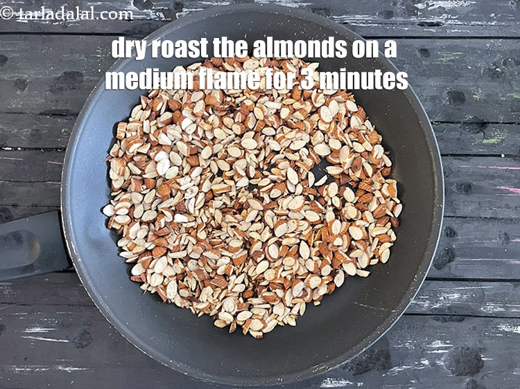 Step 12 – Roast the almonds on a medium flame for 3 minutes