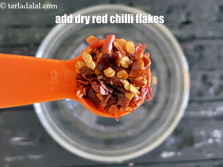 Step 6 – Add&nbsp;<meta charset="UTF-8" />2 tsp&nbsp;<a href="glossary-dry-red-chilli-flakes-paprika-338i">dry red chilli flakes (paprika)</a>.