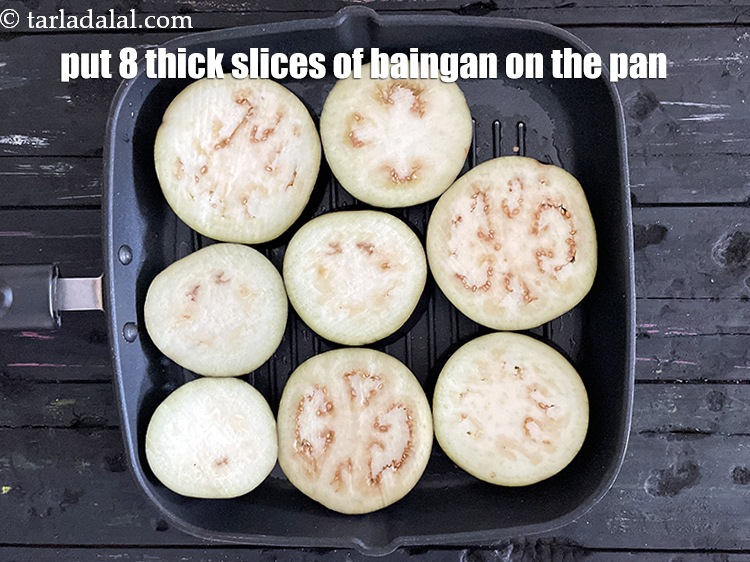 Step 6 – Arrange 8 thick&nbsp;slices of eggplant on the grill pan.&nbsp;