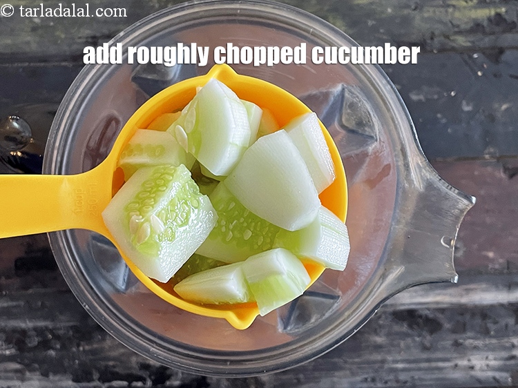 Step 6 – <html><head><meta charset="UTF-8"> </head><body><p>Add&nbsp;1 3/4 cups&nbsp;roughly&nbsp;chopped cucumber. <i><u>We have peeled the cucumber to avoid the bitterness.&nbsp;</u></i></p></body></html>
