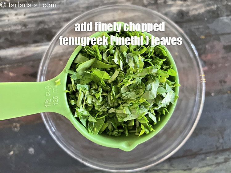 Step 6 – Add&nbsp;<meta charset="UTF-8" />1/2 cup&nbsp;finely&nbsp;<a href="glossary-chopped-fenugreek-811i">chopped fenugreek (methi) leaves</a>.
