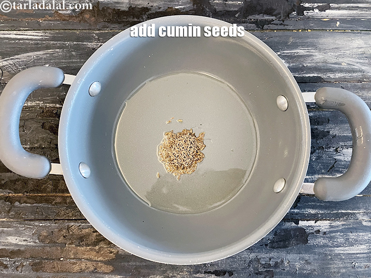 Step 10 – <meta charset="UTF-8" />Add 1 tsp&nbsp;<a href="glossary-cumin-seeds-jeera-zeera-381i">cumin seeds (jeera)</a>.