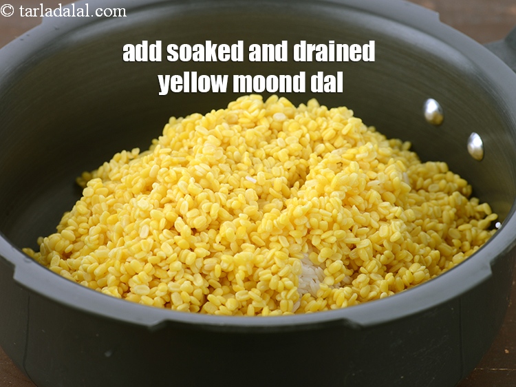 Step 5 – Add 1 cup&nbsp;<a href="https://www.tarladalal.com/glossary-yellow-moong-dal-split-yellow-gram-peeli-moong-dal-488i">yellow moong dal (split yellow gram)</a>&nbsp;, soaked for 15 minutes and drained.