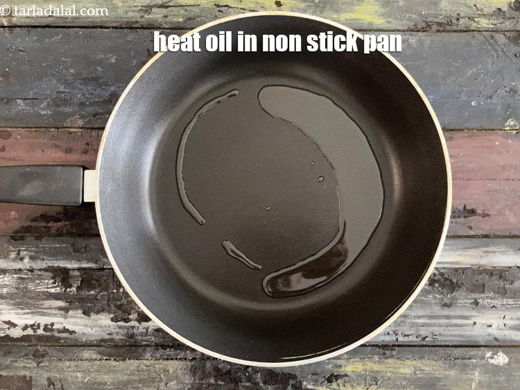 Step 7 – To make <strong>makai ni khichdi recipe | Gujarati corn khichdi |&nbsp;sweet corn khichdi |&nbsp;</strong>heat 2 …