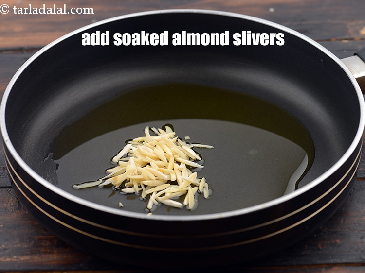 Step 4 – Add 2 tbsp&nbsp;soaked&nbsp;<a href="https://www.tarladalal.com/glossary-almond-slivers-slivered-almonds-664i">almond (badam) slivers</a>.