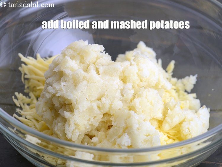 Step 5 – Add 1 cup boiled and <a href="https://www.tarladalal.com/glossary-boiled-and-mashed-potatoes-1831i">mashed potatoes</a>.