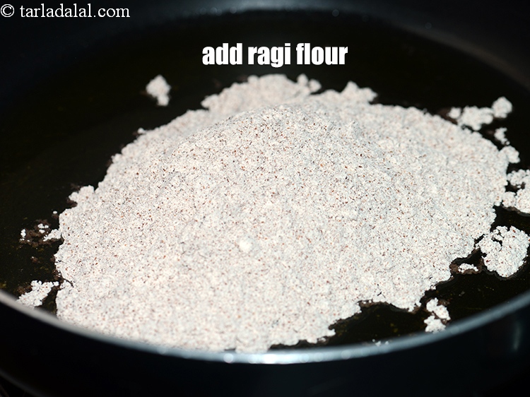 Step 5 – Add&nbsp;<meta charset="UTF-8" />1 cup&nbsp;<a href="glossary-ragi-flour-nachni-flour-nachni-ka-atta-red-millet-flour-1115i">ragi flour</a>.