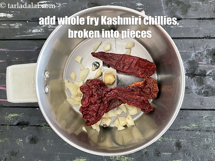 Step 12 – Add&nbsp;<meta charset="UTF-8" />4&nbsp;<a href="glossary-whole-dry-kashmiri-red-chillies-kashmiri-mirch-kashmiri-lal-mirch-332i">whole dry kashmiri red chillies</a>&nbsp;, broken into pieces.