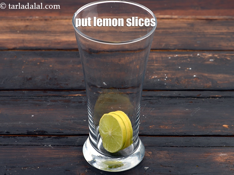Step 4 – Put 3 <a href="https://www.tarladalal.com/glossary-lemon-slices-758i">lemon slices</a>.