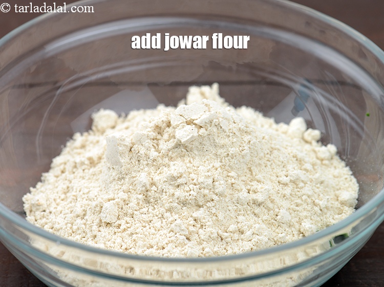 Step 4 – Add 1 cup <a href="https://www.tarladalal.com/glossary-jowar-flour-jowar-ka-atta-white-millet-flour-sorghum-flour-483i">jowar (white millet) flour</a>.