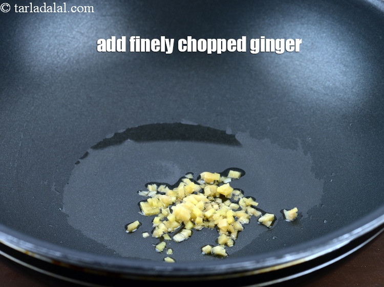 Step 4 – Add 1 tsp finely <a href="https://www.tarladalal.com/glossary-chopped-ginger-786i">chopped ginger (adrak)</a>.
