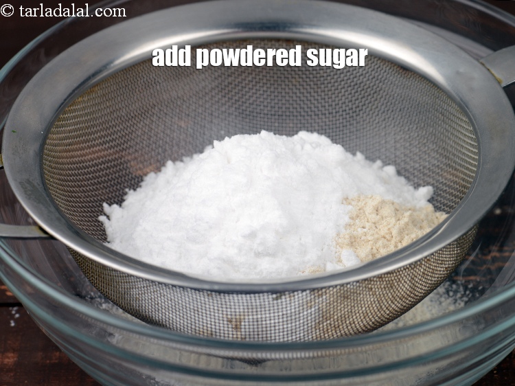Step 4 – Add 3 tbsp <a href="https://www.tarladalal.com/glossary-powdered-sugar-280i">powdered sugar</a>.