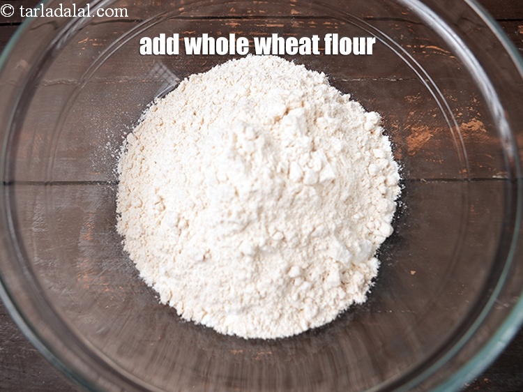 Step 4 – Add 5 tbsp <a href="https://www.tarladalal.com/glossary-whole-wheat-flour-gehun-ka-atta-gehun-ka-aata-429i">whole wheat flour (gehun ka atta)</a>.