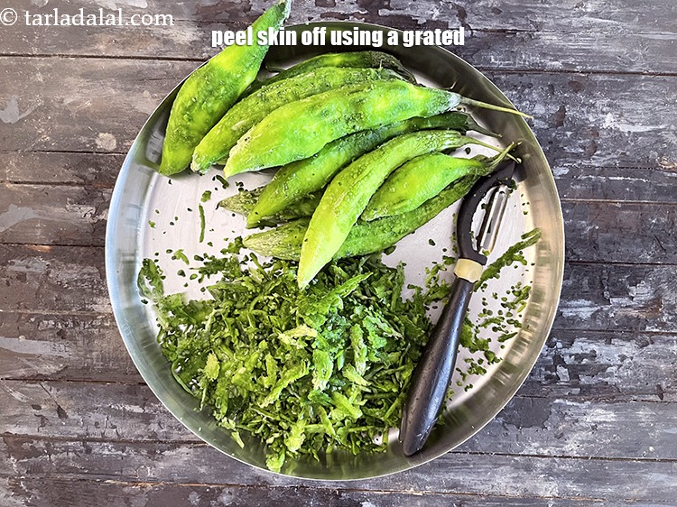 Step 4 – Peel the karela skin off using a grater.