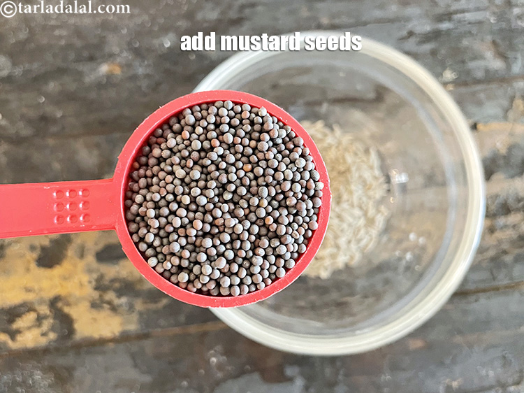 Step 18 – Add&nbsp;<meta charset="UTF-8" />1 tbsp&nbsp;<a href="glossary-mustard-seeds-sarson-rai-sarson-ke-beej-525i">mustard seeds ( rai / sarson)</a>.