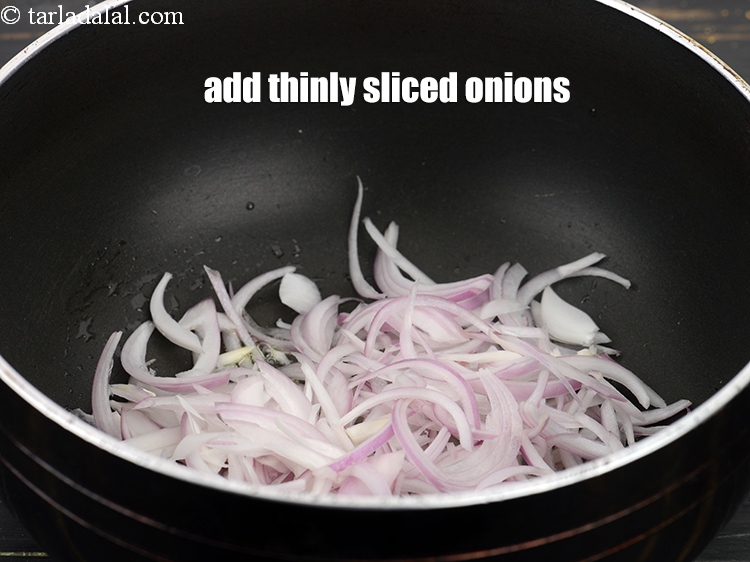 Step 5 – Add &frac12; cup thinly <a href="https://www.tarladalal.com/glossary-sliced-onions-745i">sliced onions</a>.