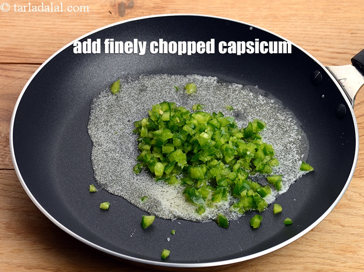 Step 4 – Add 1/4 cup&nbsp;finely&nbsp;<a href="https://www.tarladalal.com/glossary-chopped-capsicum-164i">chopped capsicum</a>.&nbsp;