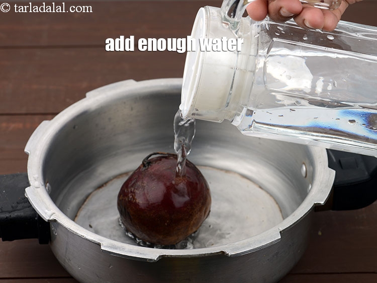 Step 4 – Add enough water in the pressure cooker.