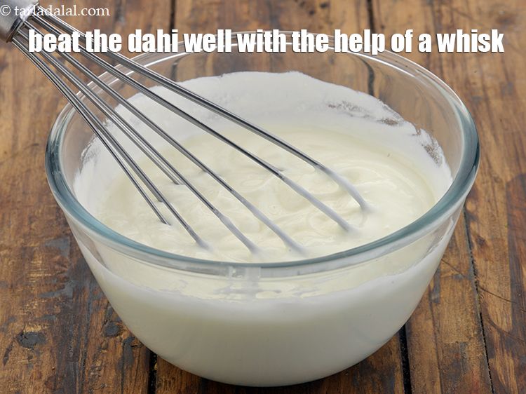 Step 14 – <meta charset="UTF-8" />Beat the dahi well with the help of a whisk. We are whisking …