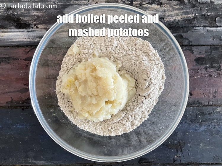 Step 4 – Add&nbsp;<meta charset="UTF-8" />3/4 cup&nbsp;<a href="glossary-boiled-and-mashed-potatoes-1831i">boiled , peeled and mashed potatoes</a>.