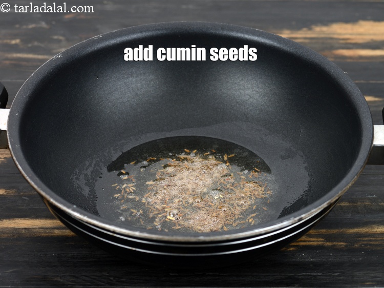 Step 11 – Add&nbsp;<meta charset="UTF-8" />1 tsp&nbsp;<a href="glossary-cumin-seeds-jeera-zeera-381i">cumin seeds (jeera)</a>&nbsp;and let the seeds crackle.
