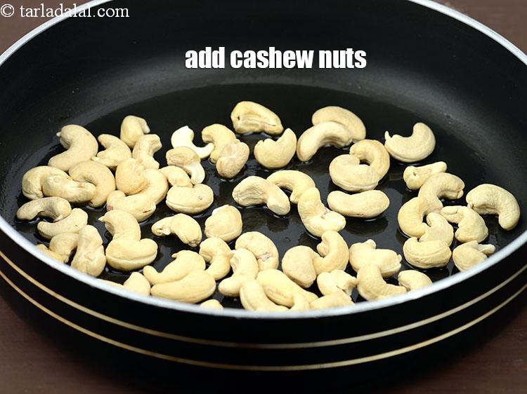 Step 4 – Add 1 cup <a href="https://www.tarladalal.com/glossary-cashew-nuts-kaju-840i">cashew nuts (kaju)</a>.
