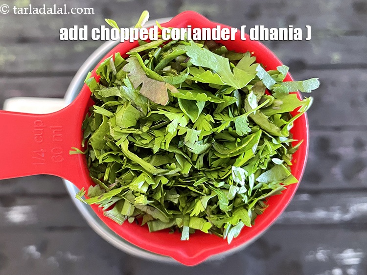 Step 13 – Add&nbsp;<meta charset="UTF-8" />1/4 cup&nbsp;<a href="glossary-chopped-coriander-783i">chopped coriander (dhania)</a>.
