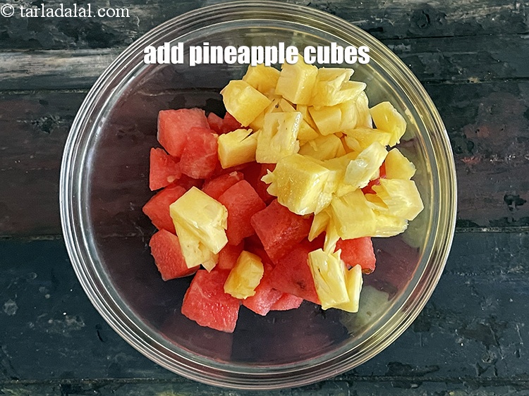Step 5 – Add 2&nbsp;cups&nbsp;<a href="glossary-pineapple-cubes-91i">pineapple cubes</a>.