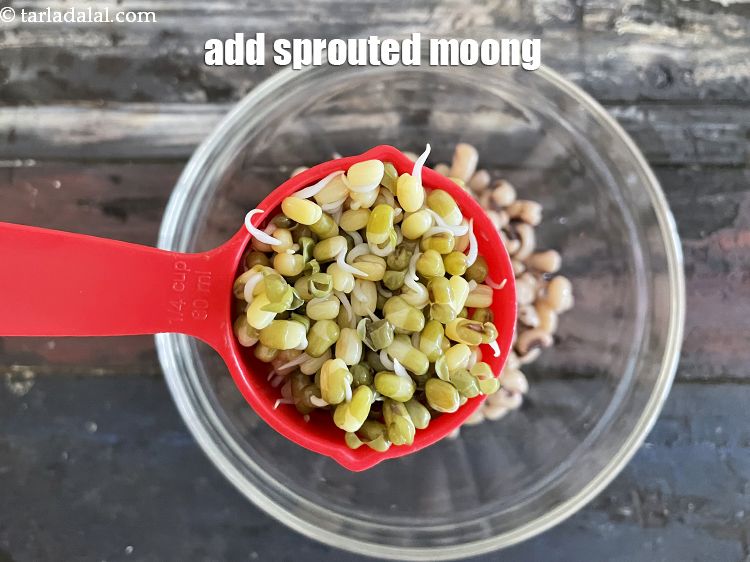 Step 21 – Add&nbsp;<meta charset="UTF-8" />1/4 cup&nbsp;<a href="glossary-sprouted-moong-moong-sprouts-988i">sprouted moong (whole green gram)</a>.