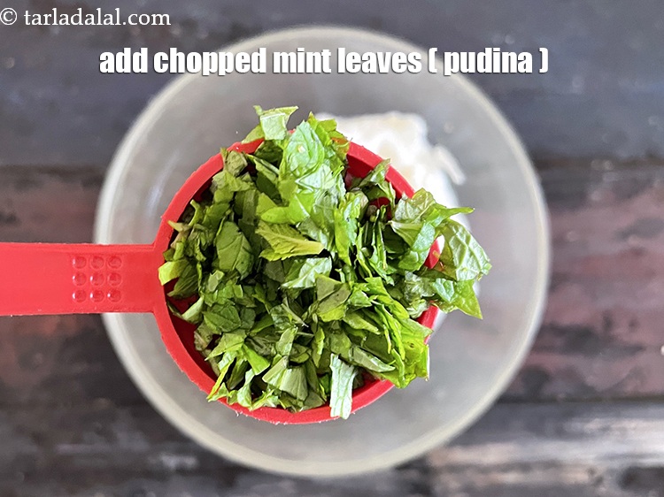 Step 17 – Add&nbsp;<meta charset="UTF-8" />2 tbsp&nbsp;finely&nbsp;<a href="glossary-chopped-mint-788i">chopped mint leaves (phudina)</a>.