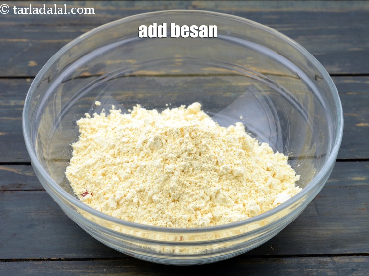 Step 5 – Add 1 cup <a href="https://www.tarladalal.com/glossary-besan-chana-dal-flour-bengal-gram-flour-952i">besan (bengal gram flour)</a>.