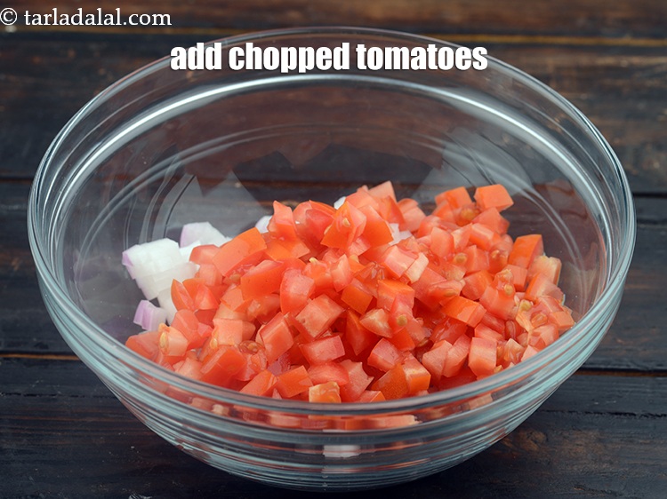 Step 4 – Add 1/2 cup&nbsp;<a href="https://www.tarladalal.com/glossary-chopped-tomatoes-779i">chopped tomatoes</a>.&nbsp;