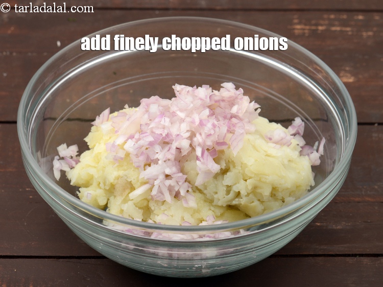 Step 4 – Add 1/4 cup&nbsp;finely&nbsp;<a href="https://tarladalal.com/glossary-chopped-onions-722i">chopped onions</a>.&nbsp;