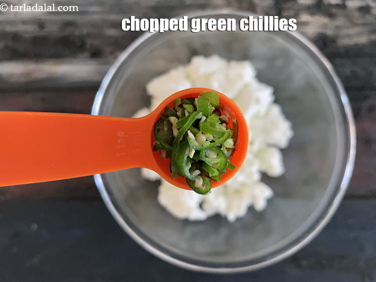 Step 8 – Add&nbsp;1 tsp&nbsp;finely&nbsp;<a href="glossary-chopped-green-chilli-820i">chopped green chillies</a>.