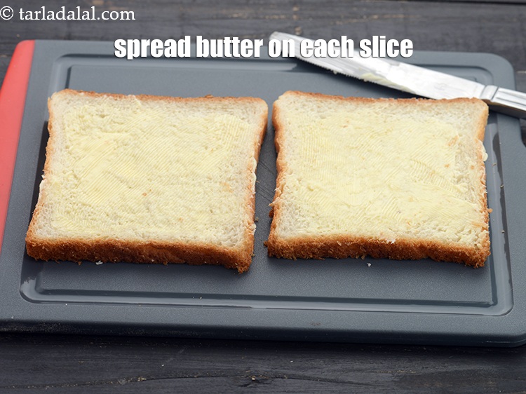 Step 4 – Spread &frac12; tsp of the butter on each slice.