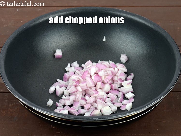 Step 4 – Add &frac12; cup <a href="https://www.tarladalal.com/glossary-chopped-onions-722i">chopped onions</a>.