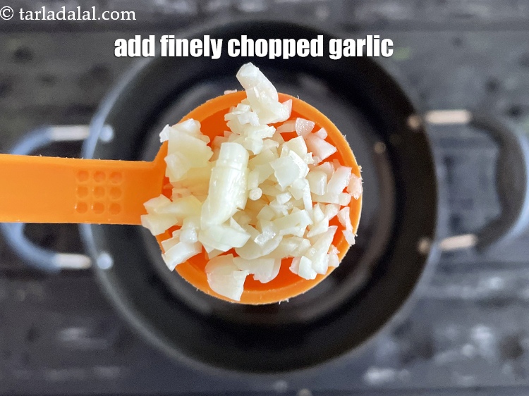 Step 10 – Add&nbsp;<meta charset="UTF-8" />2 tsp&nbsp;finely&nbsp;<a href="glossary-chopped-garlic-790i">chopped garlic (lehsun)</a>.