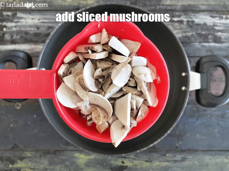 Step 7 – Add&nbsp;3/4 cup&nbsp;<a href="glossary-sliced-mushrooms-747i">sliced mushrooms (khumbh)</a>.