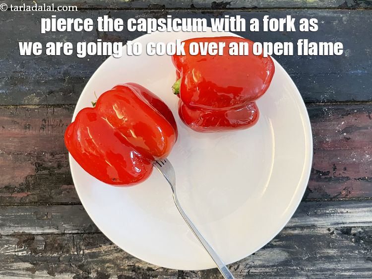 Step 8 – Pierce each red capsicum with a fork. We are going to be roasting the capsicum …