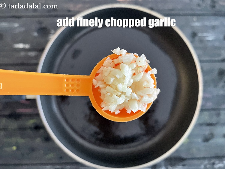 Step 13 – Add&nbsp;<meta charset="UTF-8" />2 tsp&nbsp;finely&nbsp;<a href="glossary-chopped-garlic-790i">chopped garlic (lehsun)</a>.