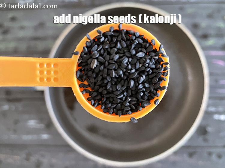 Step 21 – <meta charset="UTF-8" /> Add&nbsp;1 tsp&nbsp;<a href="glossary-nigella-seeds-kalonji-onion-seeds-552i">nigella seeds (kalonji)</a>. This is what gives a super taste …