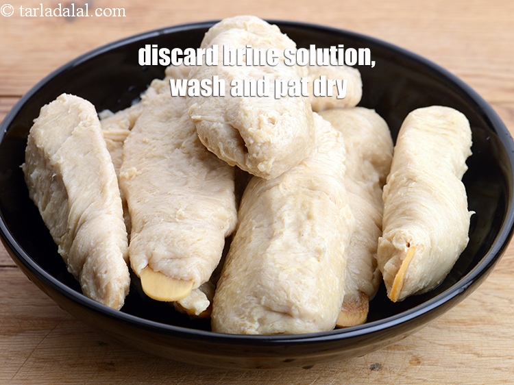 Step 8 – Discard the brine solution (liquid inside the can, in which the chaaps are dipped), and …